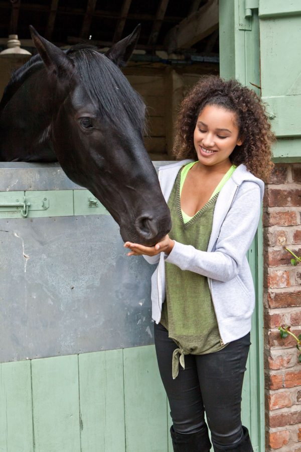 Jaylen Barron as Zoe with Raven in Free Rein