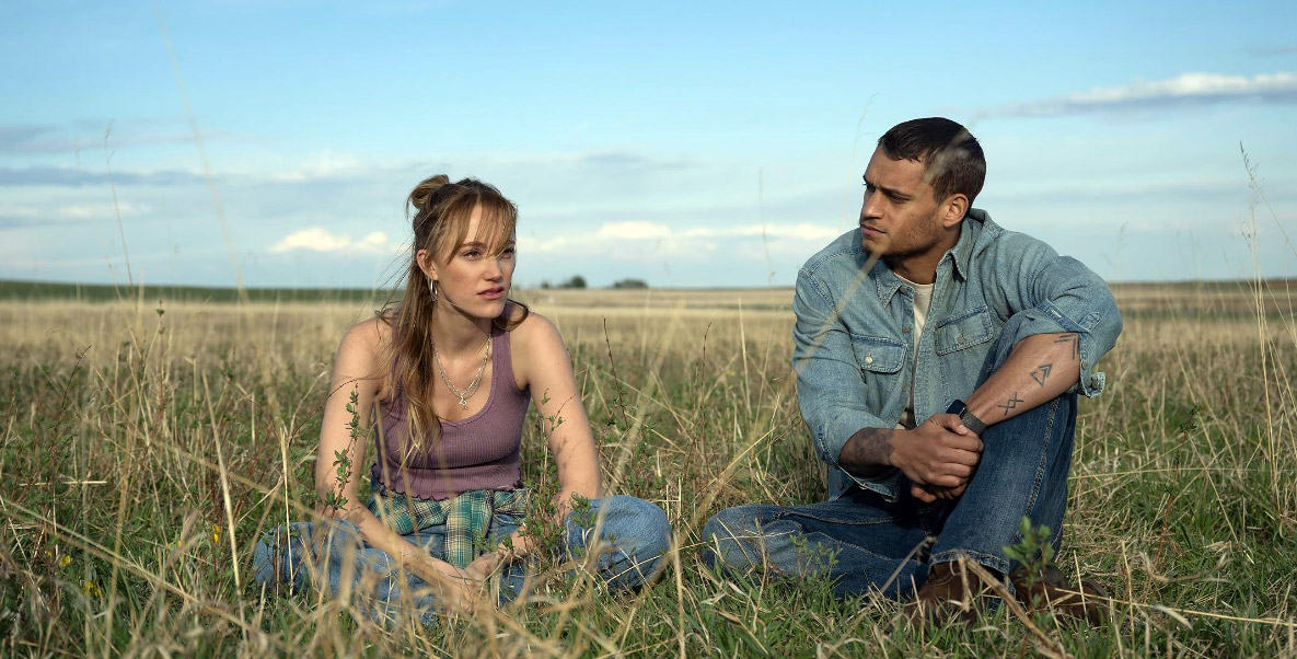 Maika Monroe and Tyriq Withers in Reminders of Him